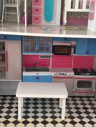 Casa de muñecas de madera