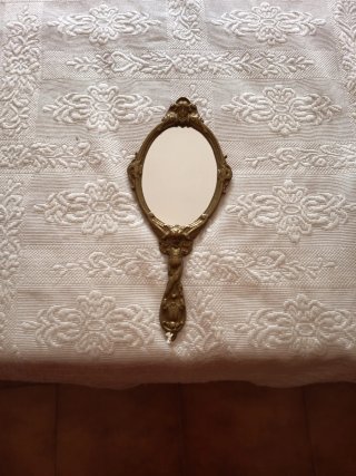 Espejo de mano antiguo dorado