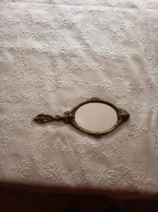 Espejo de mano antiguo dorado