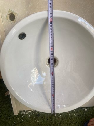 Lavabo de mármol y porcelana beige