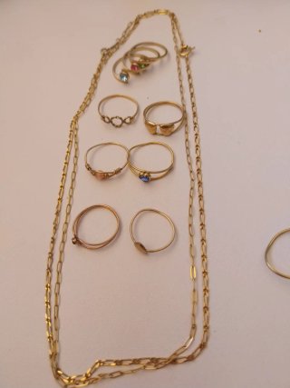 Lote 2 cadenas y 9 anillos dorados