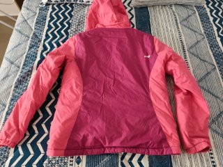 Chaqueta impermeable rosa y morada. Talla 14 años.