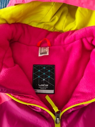 Chaqueta impermeable rosa y morada. Talla 14 años.