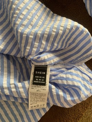 Camisa de rayas azul y blanco