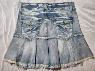 Minigonna vintage denim pieghe effetto sfrangiato
