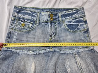 Minigonna vintage denim pieghe effetto sfrangiato