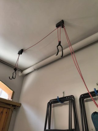 Sistema poleas para colgar baúl
