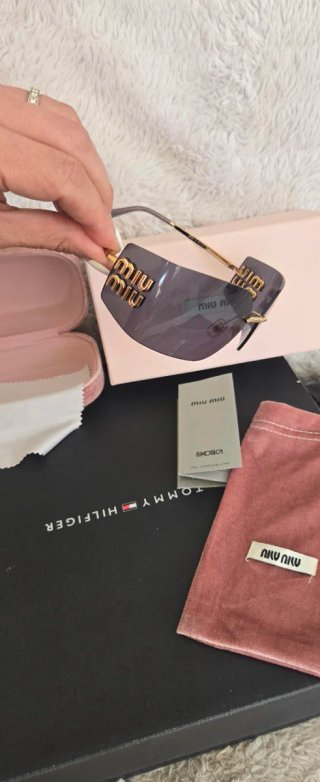 Gafas de sol Miu Miu Marrón y Dorado