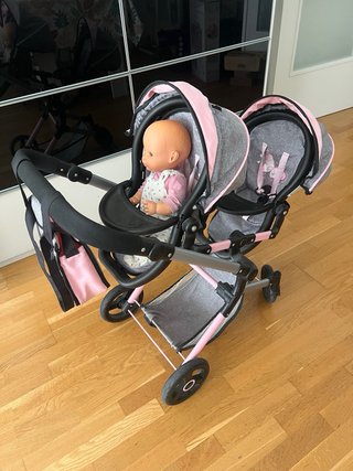 Carrito gemelar muñecas rosa y gris