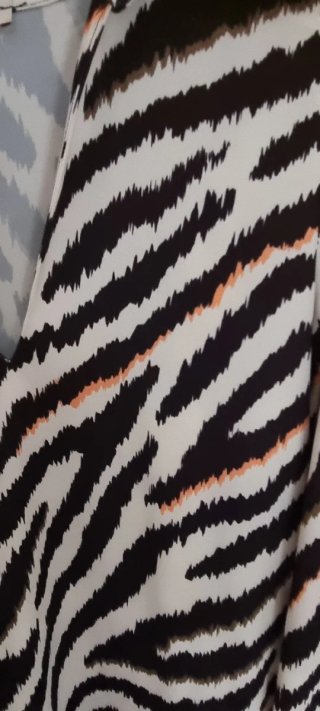 Vestido ancho estampado cebra talla xs.