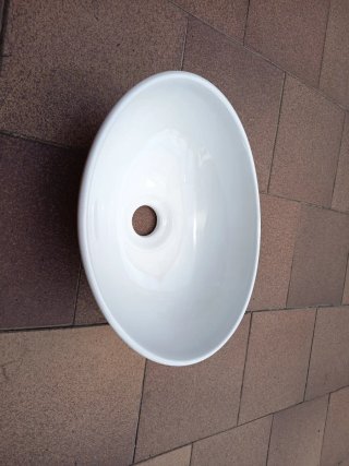 Lavabo de cerámica blanco ovalado
