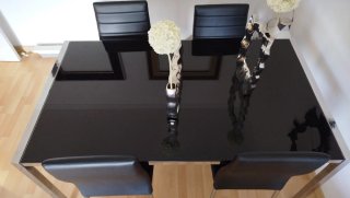 Mesa de comedor cristal y metal como nueva