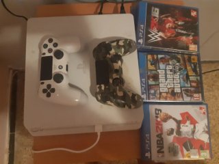 PS4 Blanca + 3 Juegos: WWE 2K16, GTA V, NBA 2K15