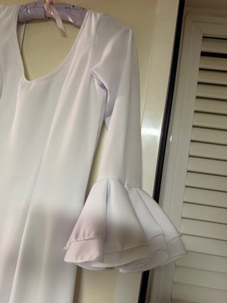 Traje de flamenca blanco volantes, tejido elastico
