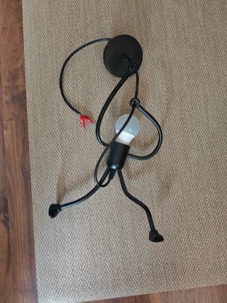 Lampara techo figura humana metal negro