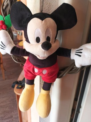 Mickey Mouse de Disney Store en columpio