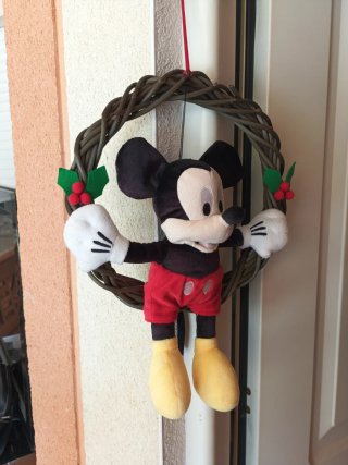 Mickey Mouse de Disney Store en columpio