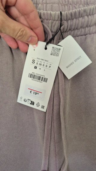 Pantalón tipo  chandal Zara colo lila desgastado