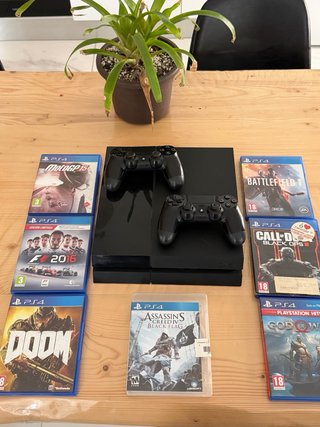 PS4 + 2 mandos originales + 8 juegos
