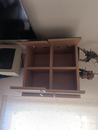 Mueble estanterías 4 compartimentos con puerta