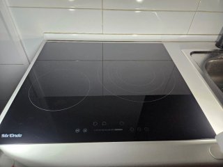 Conjunto vitrocerámica, horno y mueble cocina