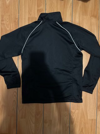 Chaqueta Nike Negra con Escudo