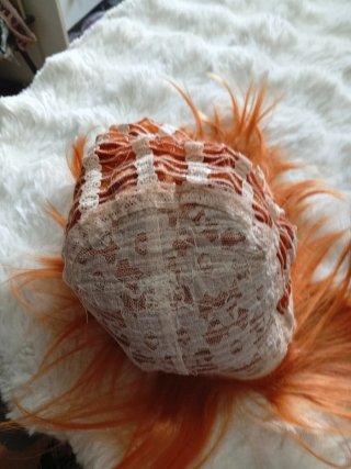Peluca naranja corta ondulada