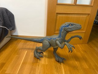 Dinosaurio de juguete realista grande