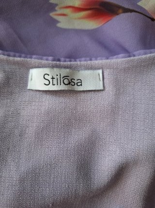 Vestito corto smanicato lilla motivo floreale