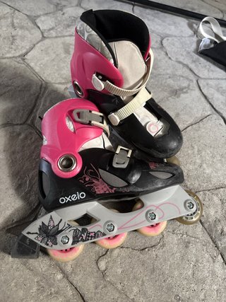 Patines en línea rosas y negros