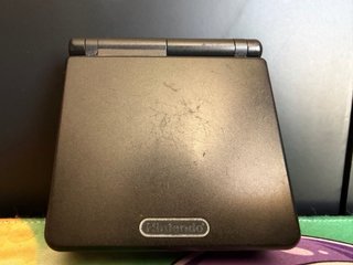 Game Boy Advance SP Negra + Pokémon Rubí