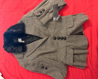 Chaqueta tweed con cuello de pelo