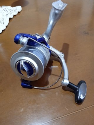 Caña y carrete de pesca EVIA ASTRAL 210.
