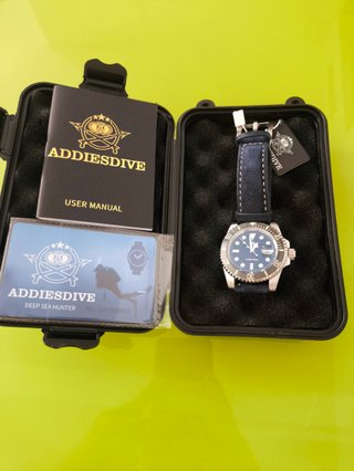 Reloj Negro y Plateado
