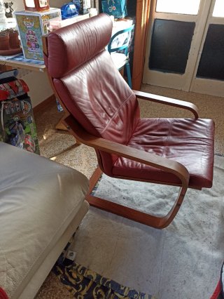 Poltrona Poang in pelle e legno