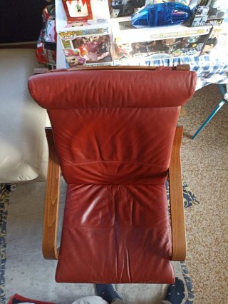 Poltrona Poang in pelle e legno