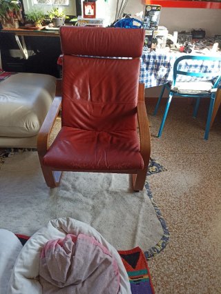 Poltrona Poang in pelle e legno
