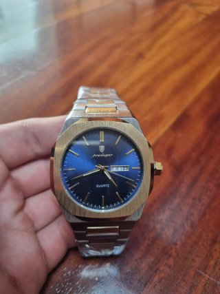Reloj Poedagar Oro y Plata