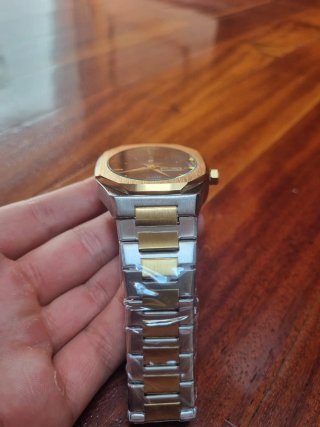 Reloj Poedagar Oro y Plata