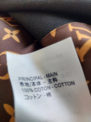 Chaqueta Louis Vuitton Negra y Dorada talla M