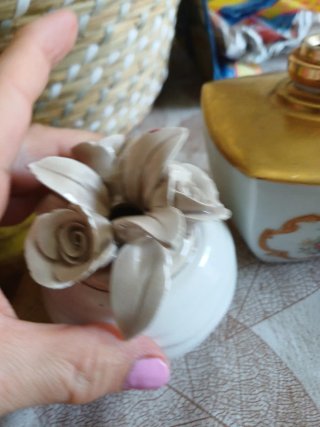 Lotto bambola carillon e porta profumo