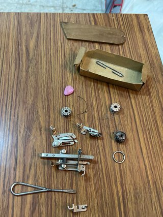 Máquina de coser Singer con mueble