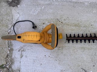 Tagliasiepi elettrico giallo