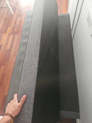 Sofá cama gris de tela