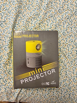 Mini proyector LED blanco y negro