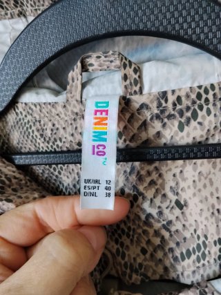 Cortavientos estampado serpiente beige/marrón