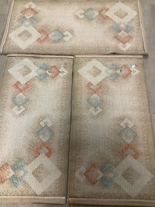 Juego de alfombras