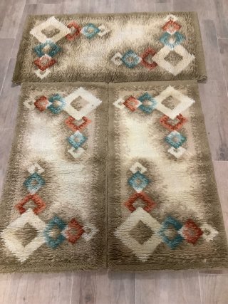 Juego de alfombras