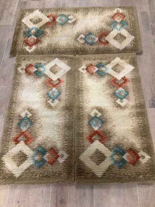 Juego de alfombras
