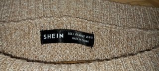 Maglione lungo con spalle cadenti